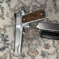 Tri Star American Classic Trophy 1911 Chrome with wooden grips. 2 magazines included.