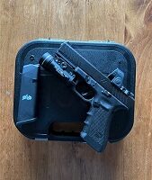 Glock 17 Gen 4 with Zev Duty Slide, TLR1-HL and Trijicon SRO